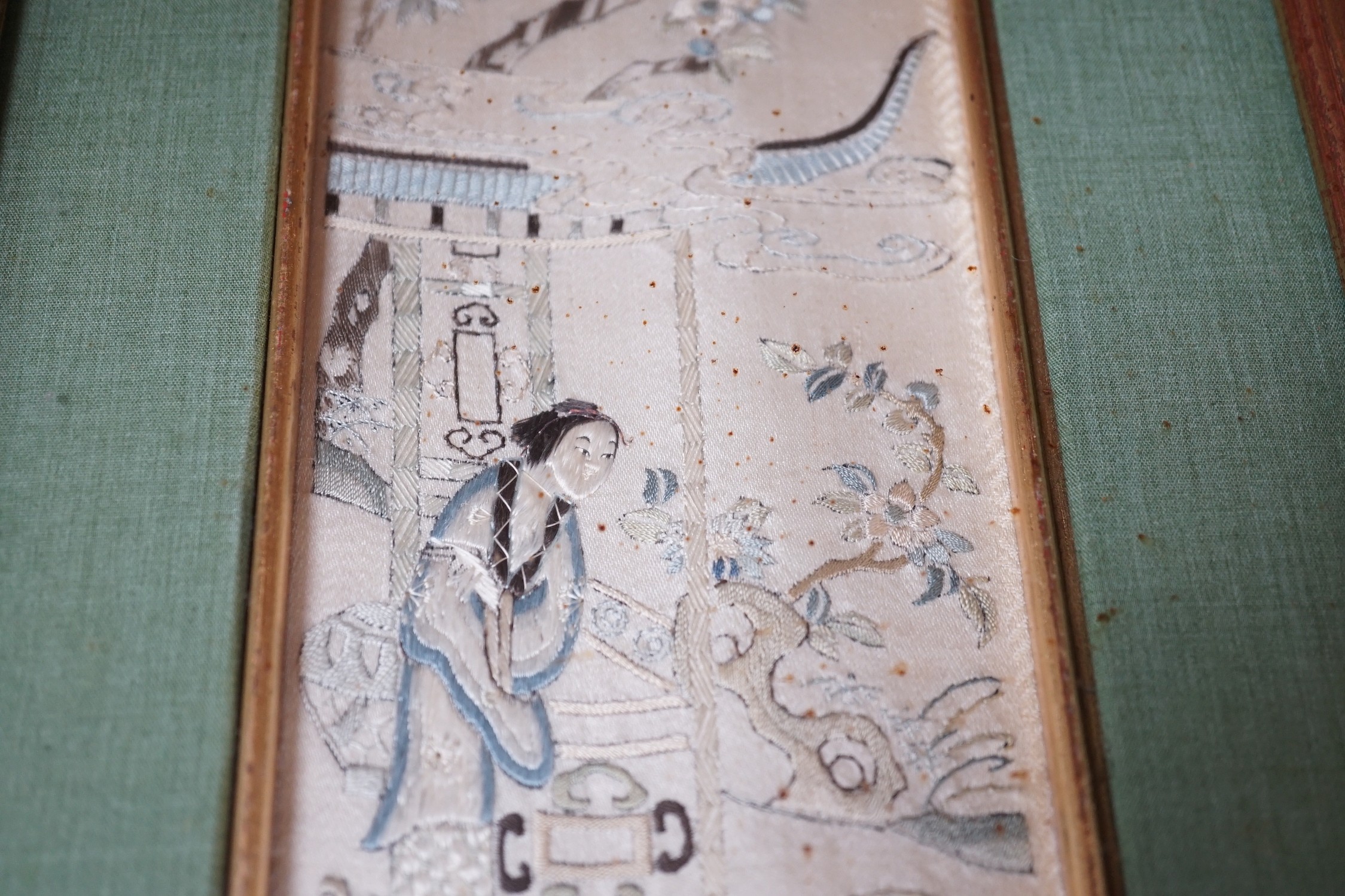 Three pairs of gilt framed, 19th century, silk embroidered, sleeve bands (for Chinese robes), 49cms long x 9cms wide (not including mount or frame)